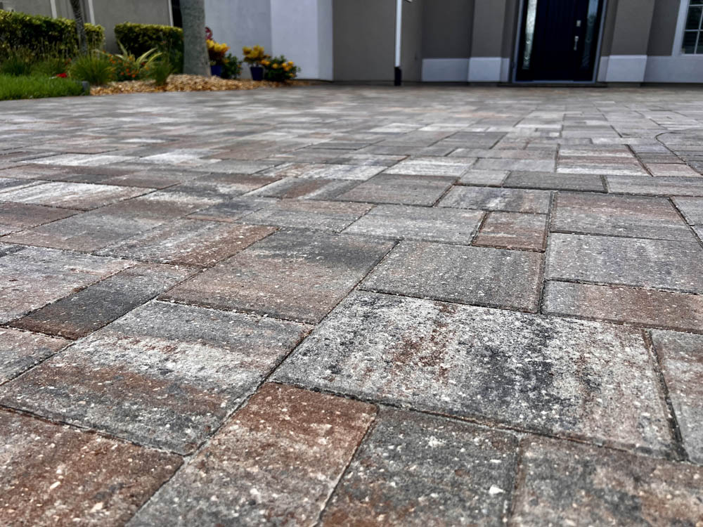 Pressure Washing and sealing on paver driveway by Stellar Clean and Seal in Brevard County